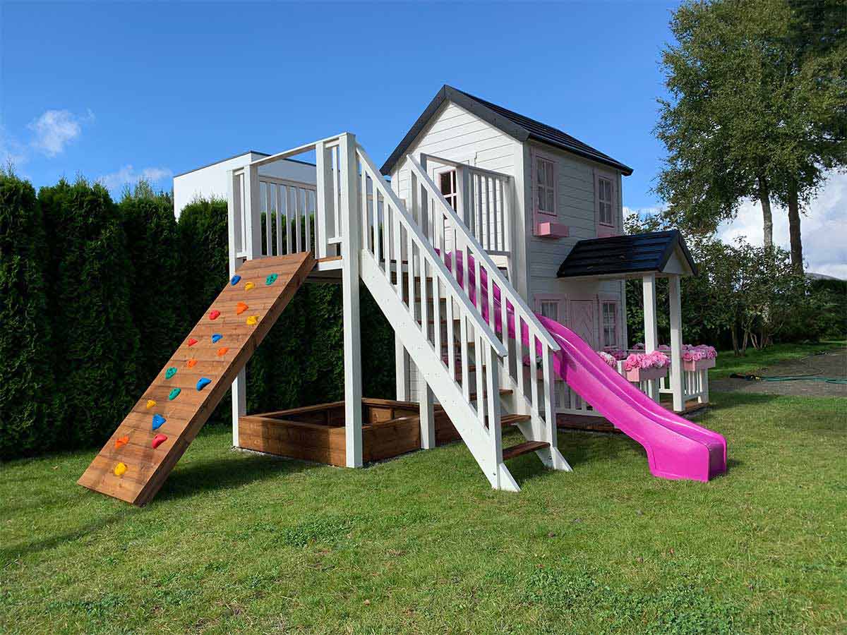KidsPlayHouses_EU double solid wood kids playhouse Princess with slide, climbing wall, balcony and sandbox.