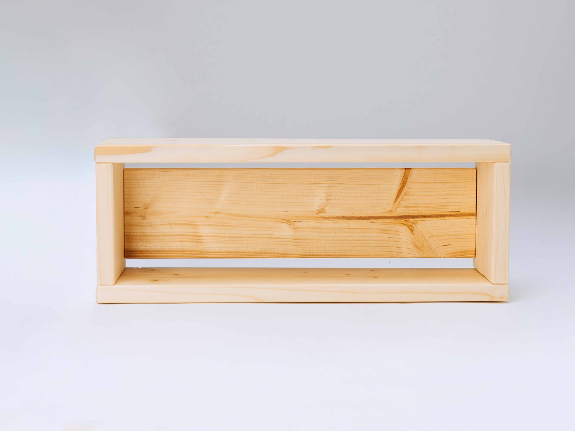 Wooden flower box, inside view, on a white background