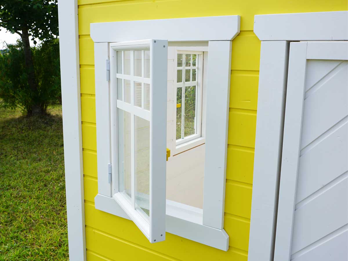 KidsPlayHouses_EU solid wood yellow playhouse Sunny Sadie with white framed open window.