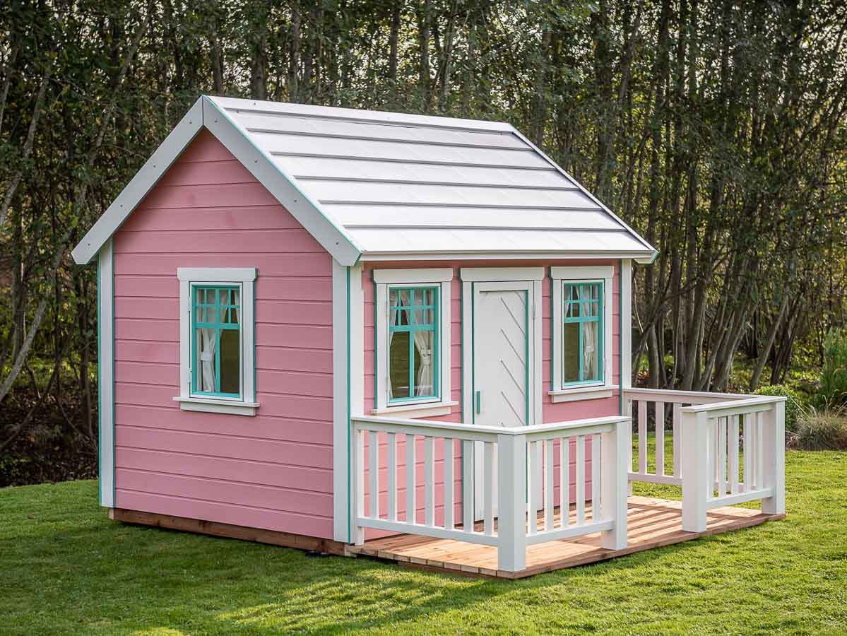 KidsPlayHouses_EU quick assemble pink kids playhouse Unicorn with wooden terrace and white railings.